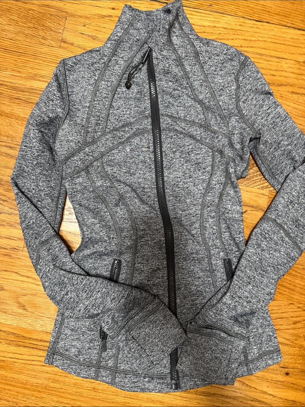 Lululemon zip up in grey size zero with thumb holes